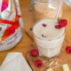 Shake One Pure White Chocolate Raspberry - 500 g Masa netto: 500 g - obrazek 2